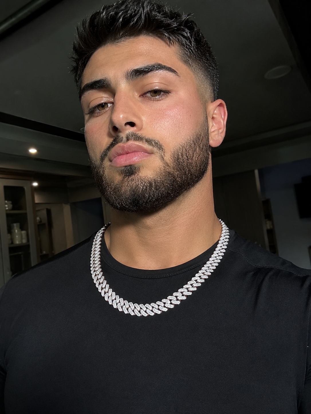 BLACKTHRONE 12MM by 22-inch custom VVS1 moissanite Cuban chain worn on body
