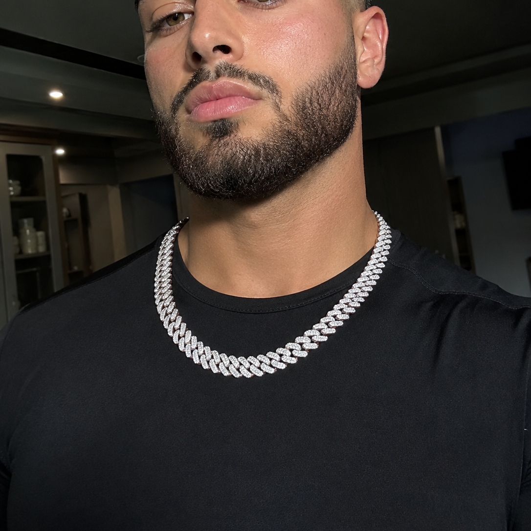BLACKTHRONE custom 12mm by 22 inch VVS1 moissanite Miami Cuban chain worn over a black shirt